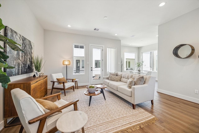 526 Janisch Rd, Houston, TX 77018 - living room with baseboards, light wood-style floors, and recessed lighting