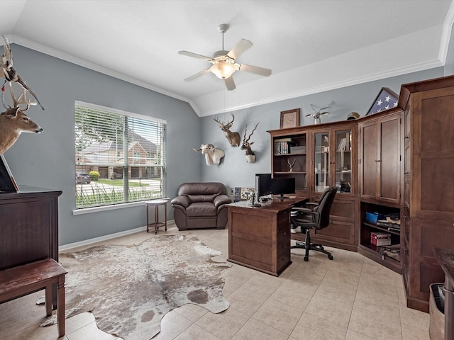 home office featuring vaulted ceiling, a ceiling fan, crown molding, and light tile patterned flooring