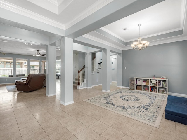 foyer featuring stairs, a chandelier, tile patterned floors, ceiling fan, and baseboards