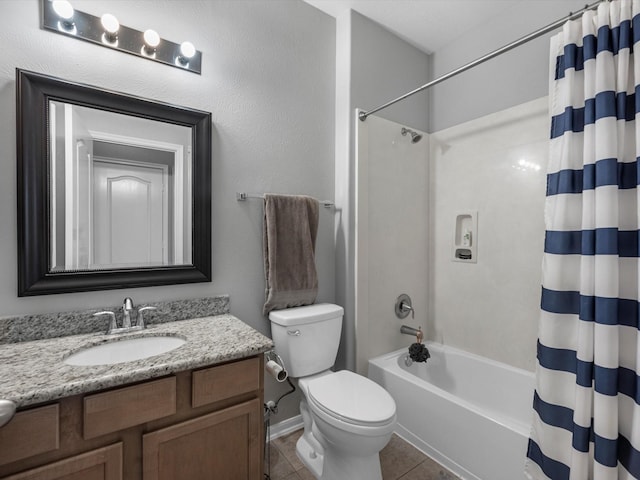 full bathroom featuring toilet, tile patterned flooring, vanity, shower / tub combo, and baseboards