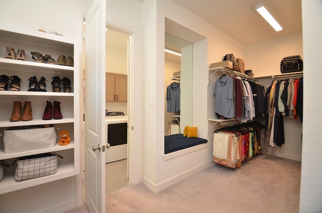 11610 Bryson Creek Ct, Cypress, TX 77433 - walk in closet featuring washer / clothes dryer and light carpet