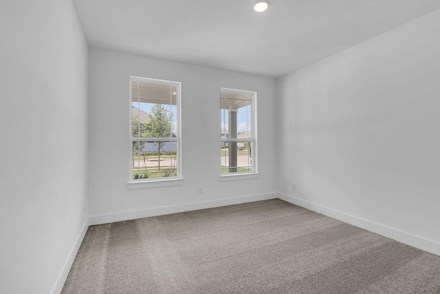 8235 Red Shiner Way, Fulshear, TX 77441 - spare room featuring carpet and recessed lighting