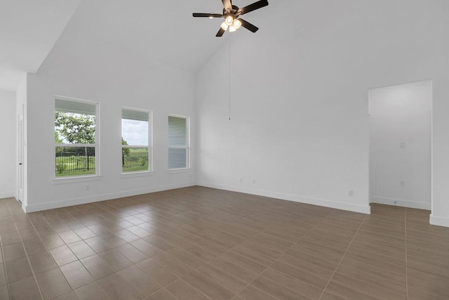 8235 Red Shiner Way, Fulshear, TX 77441 - unfurnished room featuring high vaulted ceiling, a ceiling fan, and tile patterned floors