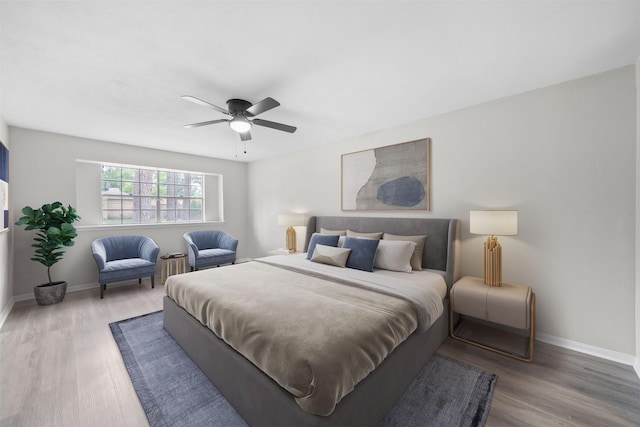 3915 Glenheather Dr, Houston, TX 77068 - bedroom with wood finished floors, baseboards, and ceiling fan