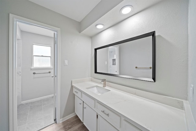3915 Glenheather Dr, Houston, TX 77068 - bathroom featuring vanity and baseboards