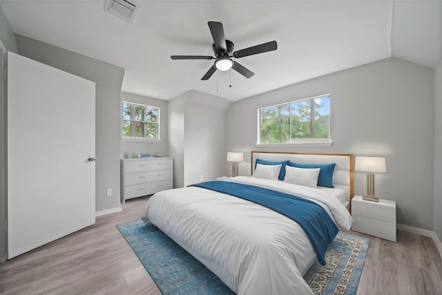3915 Glenheather Dr, Houston, TX 77068 - bedroom with vaulted ceiling, baseboards, ceiling fan, and wood finished floors