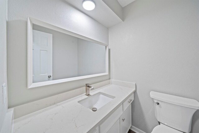 3915 Glenheather Dr, Houston, TX 77068 - half bathroom featuring toilet and vanity