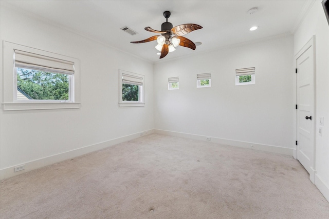 6216 Queenswood Ln, Houston, TX 77008 - empty room with crown molding, ceiling fan, light colored carpet, recessed lighting, and baseboards