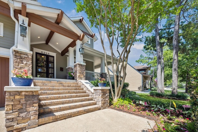 6216 Queenswood Ln, Houston, TX 77008 - property entrance featuring covered porch and stone siding