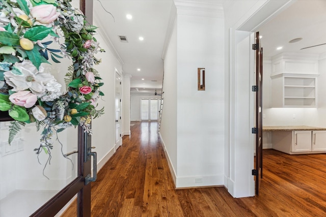 6216 Queenswood Ln, Houston, TX 77008 - hallway with crown molding, wood finished floors, baseboards, and recessed lighting