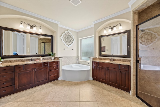 18814 Luby Creek Dr, Cypress, TX 77433 - bathroom with ornamental molding, two vanities, a shower stall, a garden tub, and tile patterned flooring