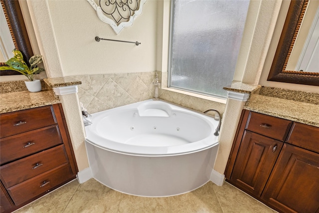 18814 Luby Creek Dr, Cypress, TX 77433 - full bath featuring vanity, a tub with jets, and tile patterned floors