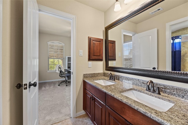 18814 Luby Creek Dr, Cypress, TX 77433 - full bath with double vanity and baseboards