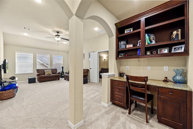 18814 Luby Creek Dr, Cypress, TX 77433 - office area featuring light carpet, built in study area, a ceiling fan, arched walkways, and recessed lighting