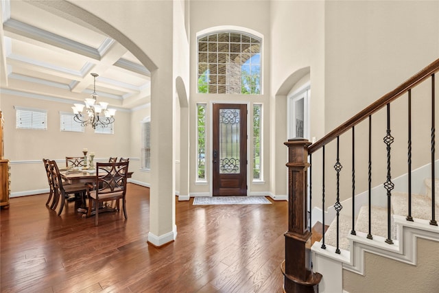 18814 Luby Creek Dr, Cypress, TX 77433 - entryway with arched walkways, crown molding, plenty of natural light, beam ceiling, and stairs