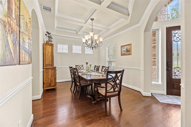 18814 Luby Creek Dr, Cypress, TX 77433 - dining area featuring plenty of natural light, dark wood-type flooring, arched walkways, beam ceiling, and coffered ceiling