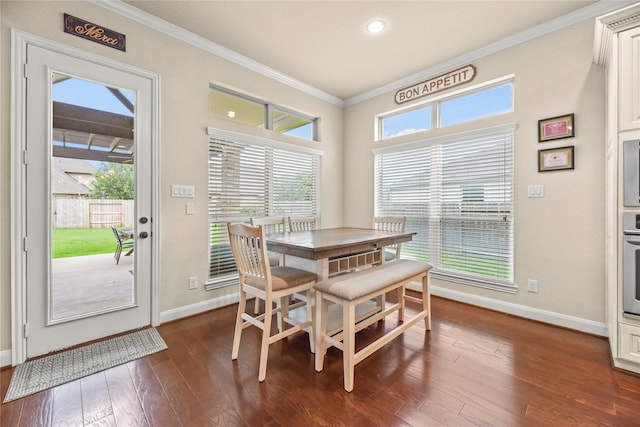 18814 Luby Creek Dr, Cypress, TX 77433 - dining room with crown molding, baseboards, dark wood-style floors, and healthy amount of natural light