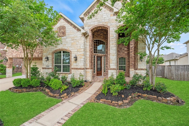 18814 Luby Creek Dr, Cypress, TX 77433 - french country inspired facade featuring stone siding and brick siding