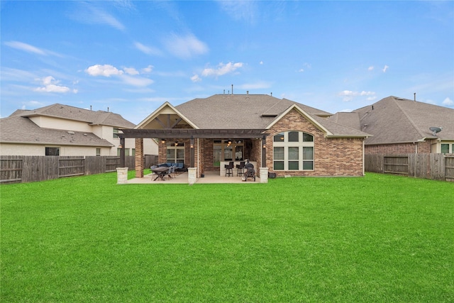 18814 Luby Creek Dr, Cypress, TX 77433 - rear view of house featuring ceiling fan, brick siding, roof with shingles, and a patio area