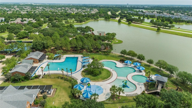 18814 Luby Creek Dr, Cypress, TX 77433 - drone / aerial view of a pool area, a large body of water, and a tree filled landscape