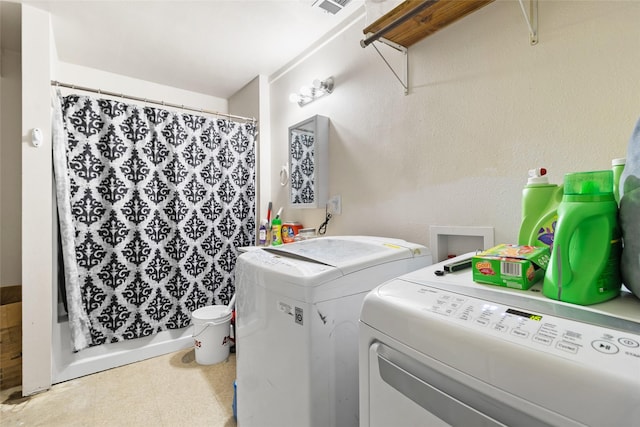 4429 W State Highway 31, Corsicana, TX 75110 - washroom with washing machine and clothes dryer and tile patterned floors
