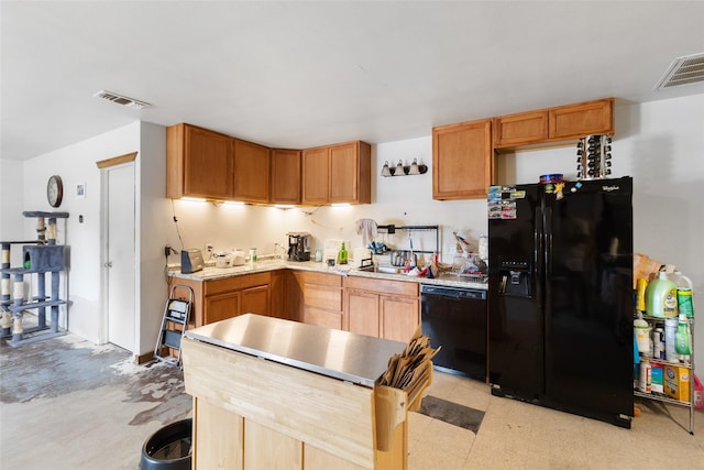 4429 W State Highway 31, Corsicana, TX 75110 - kitchen with black appliances, light countertops, light flooring, and a sink