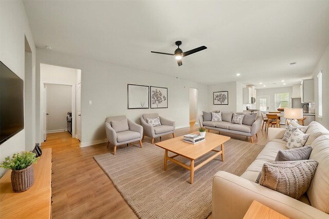 820 Dawn Redwood Ct, Conroe, TX 77304 - living area with light wood-style flooring, a ceiling fan, baseboards, and recessed lighting