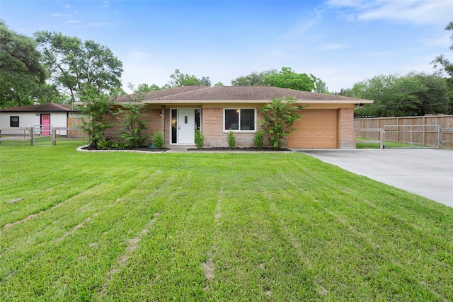single story home featuring a garage, brick siding, and driveway