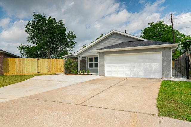 3618 Tamfield Dr, Houston, TX 77066 - ranch-style house featuring brick siding, concrete driveway, and fence