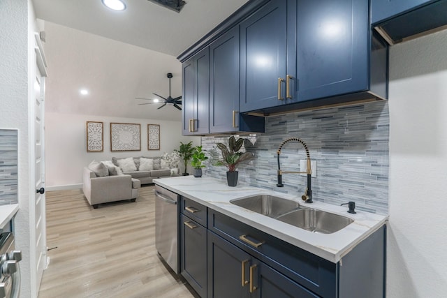 3618 Tamfield Dr, Houston, TX 77066 - kitchen featuring a sink, stainless steel dishwasher, tasteful backsplash, light wood finished floors, and a ceiling fan