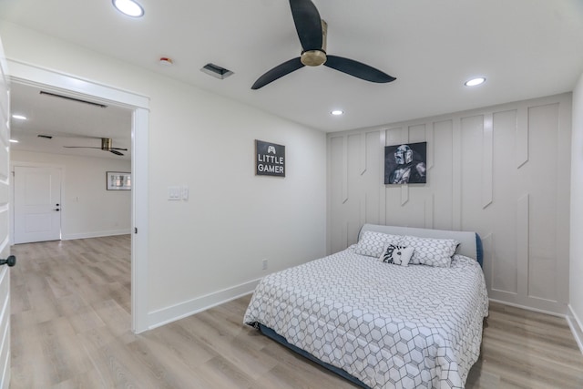 3618 Tamfield Dr, Houston, TX 77066 - bedroom with light wood-type flooring, recessed lighting, a ceiling fan, and baseboards