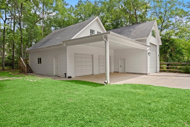 10 Hollow Glen Ln, Tomball, TX 77375 - garage featuring concrete driveway