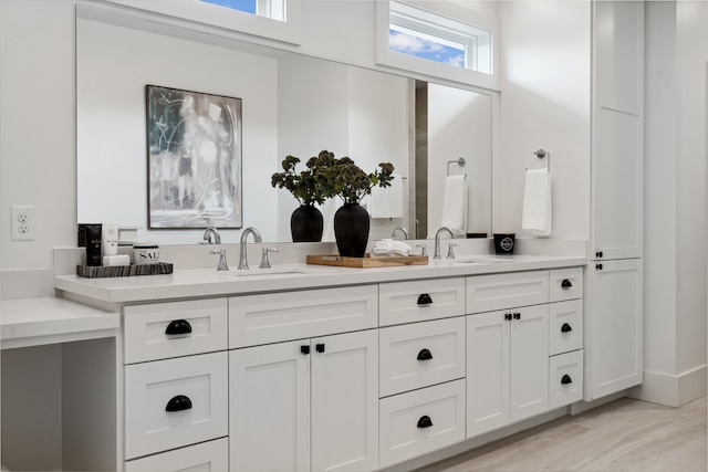 bathroom with double vanity