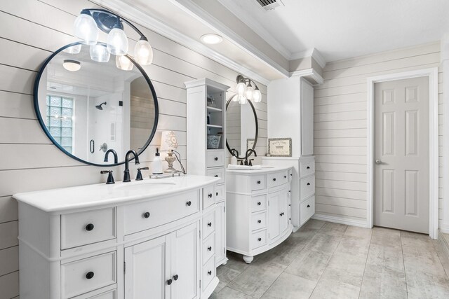 42 Cherry Hill Dr, Conroe, TX 77304 - full bath with wood walls, two vanities, and crown molding