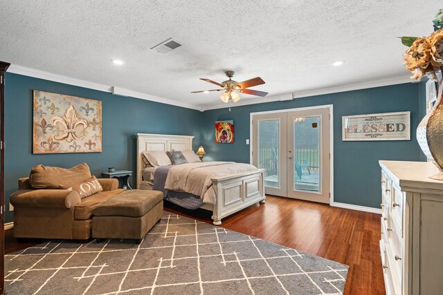 42 Cherry Hill Dr, Conroe, TX 77304 - bedroom featuring access to outside, crown molding, french doors, hardwood / wood-style floors, and baseboards