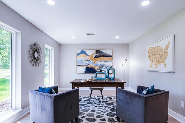 home office featuring recessed lighting, wood finished floors, and baseboards