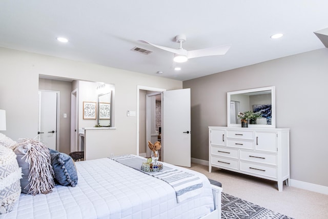bedroom featuring light colored carpet, recessed lighting, baseboards, and ceiling fan