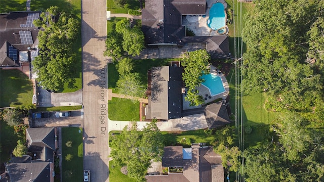 drone / aerial view of a pool