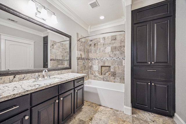 bathroom featuring ornamental molding, shower / bathtub combination, vanity, and baseboards