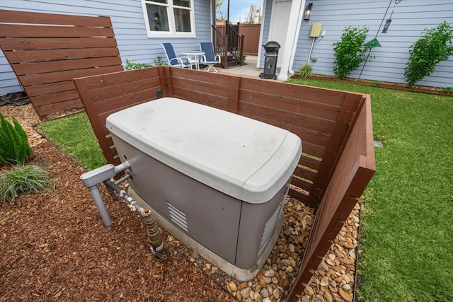 exterior view of a jacuzzi and fence