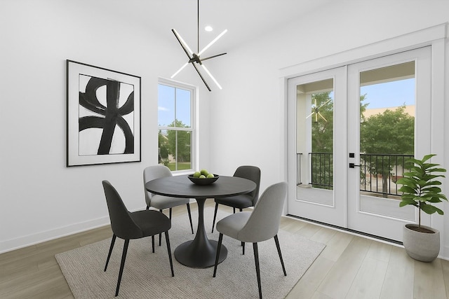 1264 Finnigan St, Houston, TX 77020 - dining area featuring french doors, plenty of natural light, light wood-style flooring, and recessed lighting