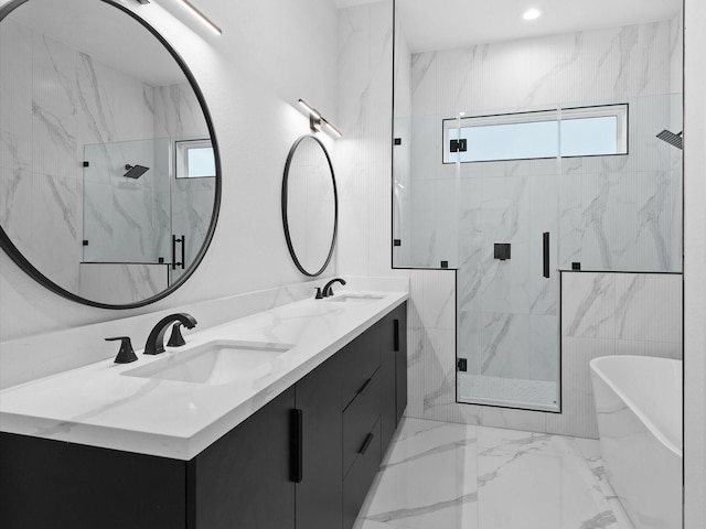 1264 Finnigan St, Houston, TX 77020 - full bathroom with marble finish flooring, a marble finish shower, healthy amount of natural light, double vanity, and recessed lighting