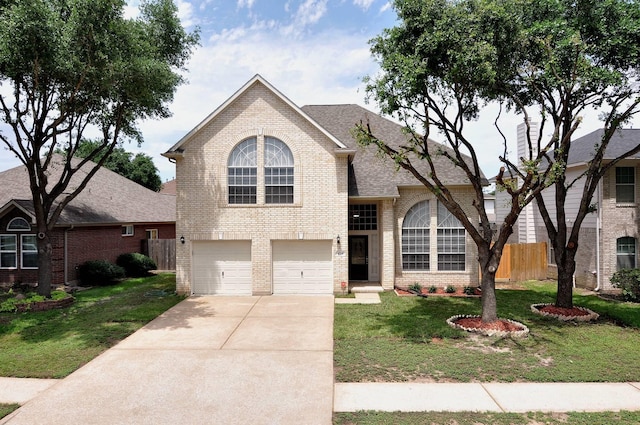 view of front of property with brick siding, concrete driveway, an attached garage, and a shingled roof