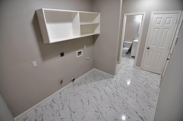 laundry area with gas dryer hookup, hookup for an electric dryer, light marble finish floors, hookup for a washing machine, and baseboards