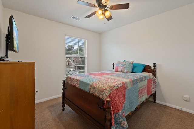 18910 S Sapling Oaks Pl, Magnolia, TX 77355 - bedroom with carpet flooring, baseboards, and a ceiling fan