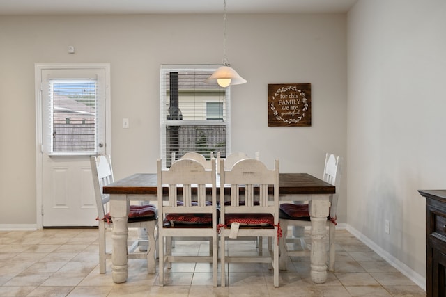 18910 S Sapling Oaks Pl, Magnolia, TX 77355 - dining room with light tile patterned floors and baseboards