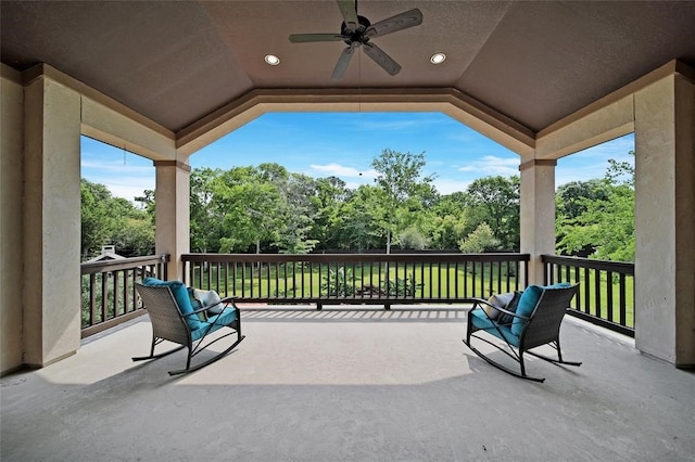 14710 Turquoise Ct, Willis, TX 77378 - view of patio / terrace with a ceiling fan and view of scattered trees
