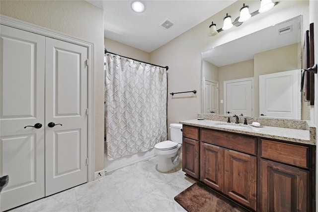 14710 Turquoise Ct, Willis, TX 77378 - bathroom featuring toilet, vanity, and marble look tile flooring