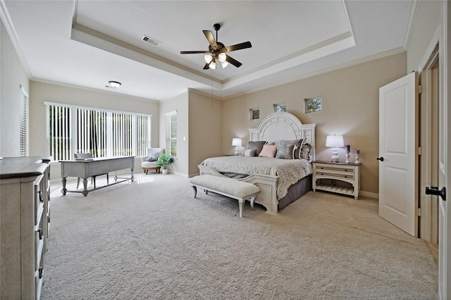 14710 Turquoise Ct, Willis, TX 77378 - bedroom with a tray ceiling, carpet flooring, ornamental molding, baseboards, and ceiling fan