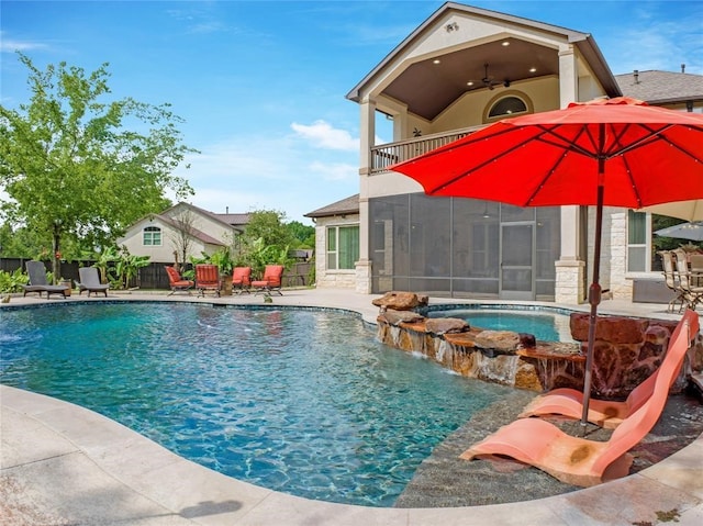 14710 Turquoise Ct, Willis, TX 77378 - view of pool featuring a patio, fence, ceiling fan, and a sunroom
